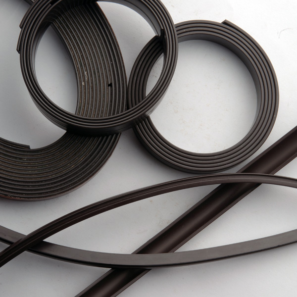 Flexible rubber coated magnet strip